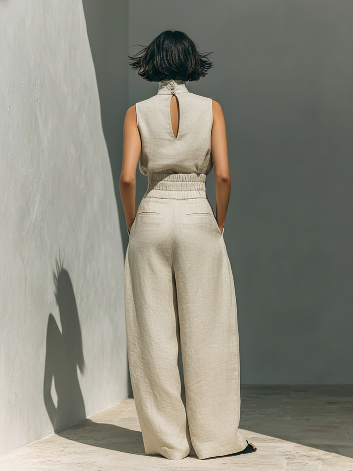 Aurora | Set consisting of a sleeveless beige top and wide-leg pants