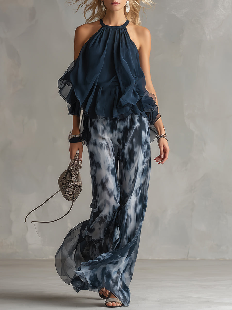 Ludovica - elegant in chiffon with a high-neck top and wide printed trousers
