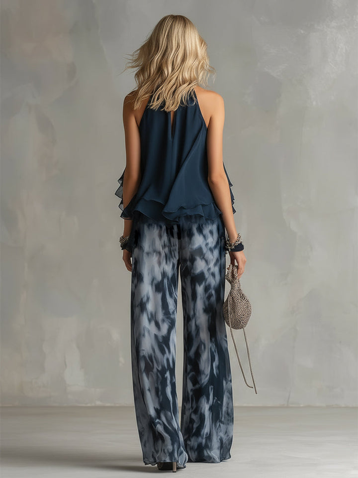 Ludovica - elegant in chiffon with a high-neck top and wide printed trousers