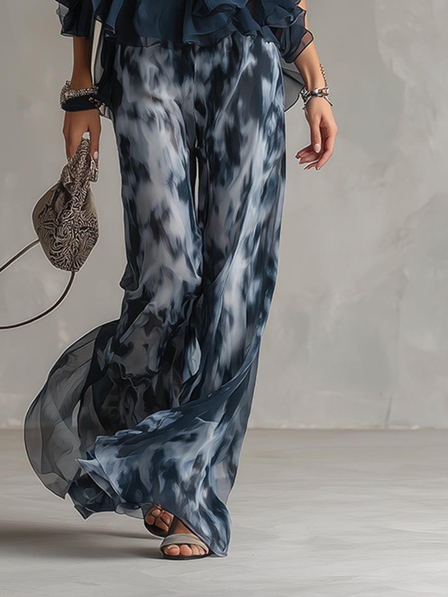 Ludovica - elegant in chiffon with a high-neck top and wide printed trousers