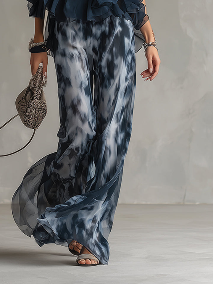 Ludovica - elegant in chiffon with a high-neck top and wide printed trousers